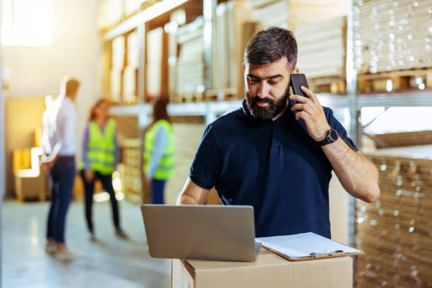 Dynamics 365 Commerce 3 startup small business owner checking or accepting orders on his laptop Dynamics 365 Commerce Vatsin Technology Solutions