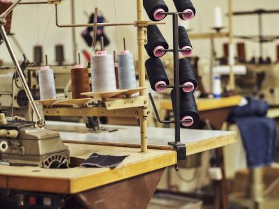 close-up-image-lot-coils-with-threads-sewing-workshop_613910-19021